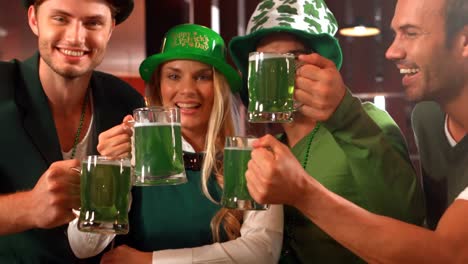 Happy-friends-celebrating-St-Patrick-day-