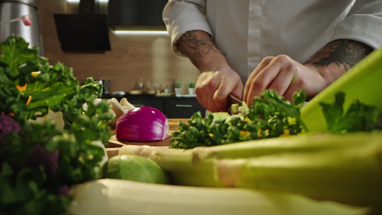 Chef preparing fresh vegetables in the kitchen