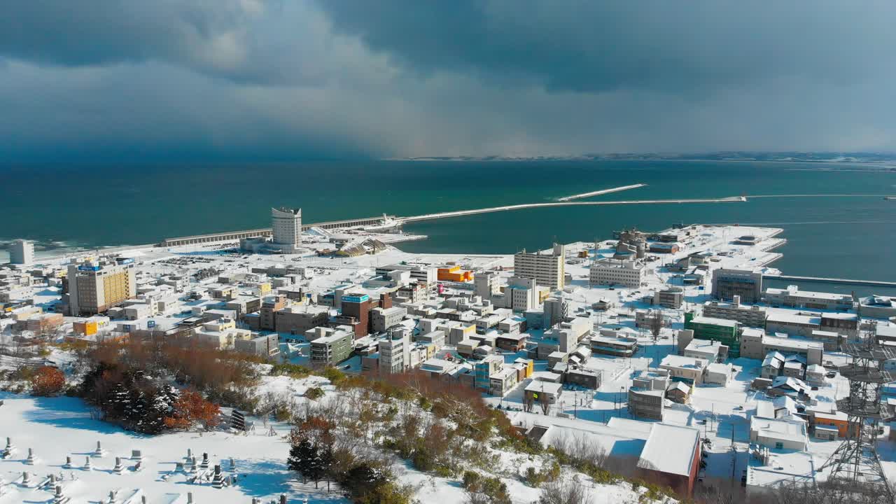 Snowy Coastal Town in Japan - Aerial View