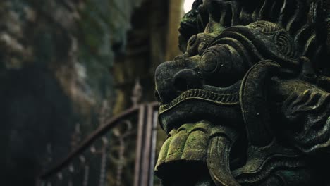 up-close balinese hindu temple decorative sculpture in bali, indonesia