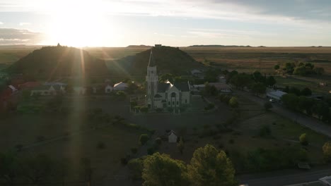 aerial view of a church in a small town at sunset, namibia