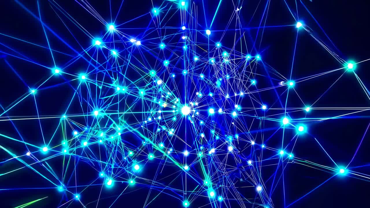 Dynamic video of interconnected neon lines forming a web-like structure, captured from a high-angle