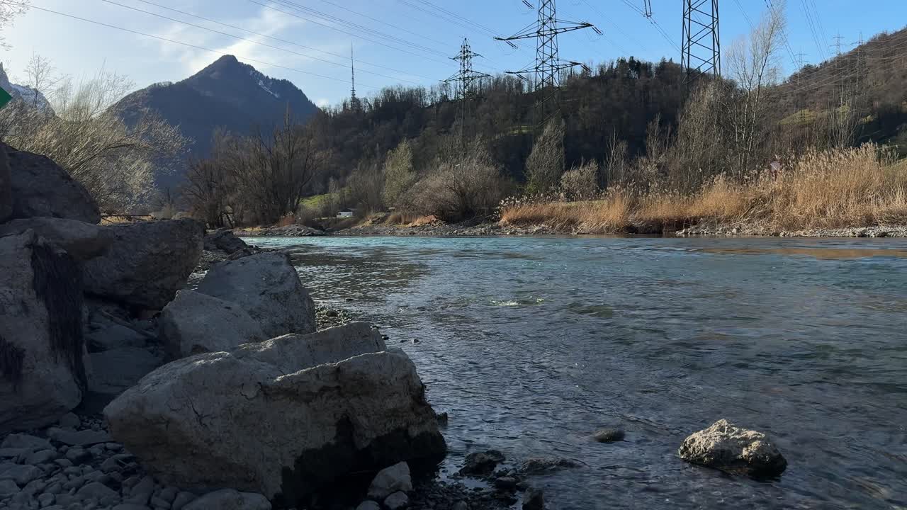 River creek water flow Switzerland nature outdoor Swiss Alps peak view