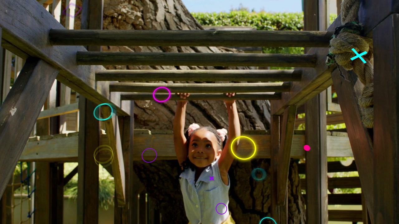 Vertical video: Girl grabbing bars pulling up lowering making motion rings around her for education