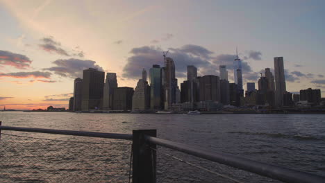 Gimbal-shot-of-lower-manhattan-waterfront-at-sunset