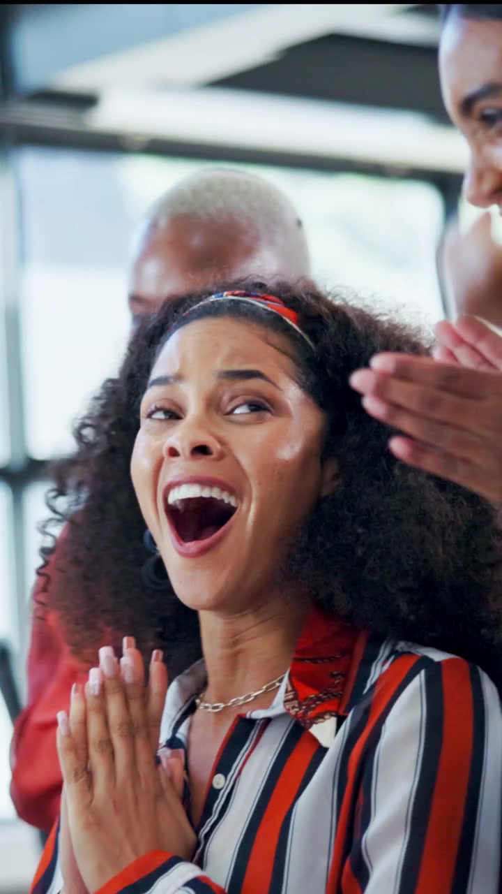 Excited Diverse Team Celebrating Success in Office