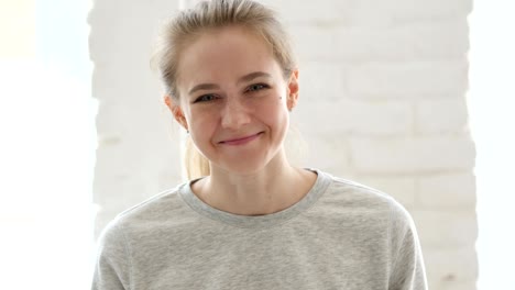 young woman celebrating success, excited