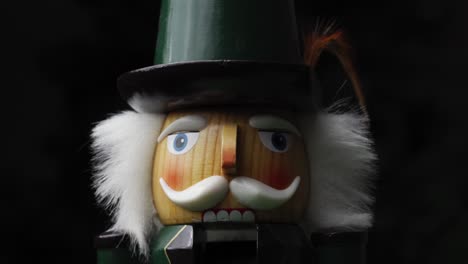 Closeup-Of-A-Wooden-Nutcracker-Face,-Festive-Christmas-Decoration-Statue