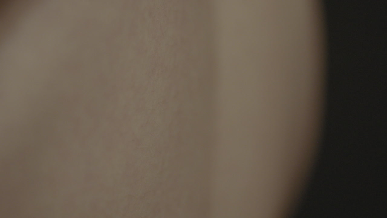 Male skin breathing, hand on stomach 4K