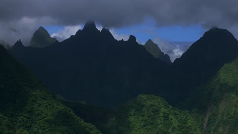 vallee de tautira river valley bay vaitepiha villageteahupoo tahiti island french polynesia aerial drone jagged mountain aorai peak aorai taiarapu taravao north shore cloudy shade parallax right