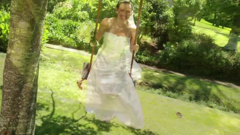 bride playing on a swing