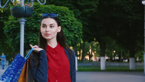 Successful-Shopping-Stylish-Woman-Walking-Down-The-Street-With-Shopping-Bags-Hd-Video