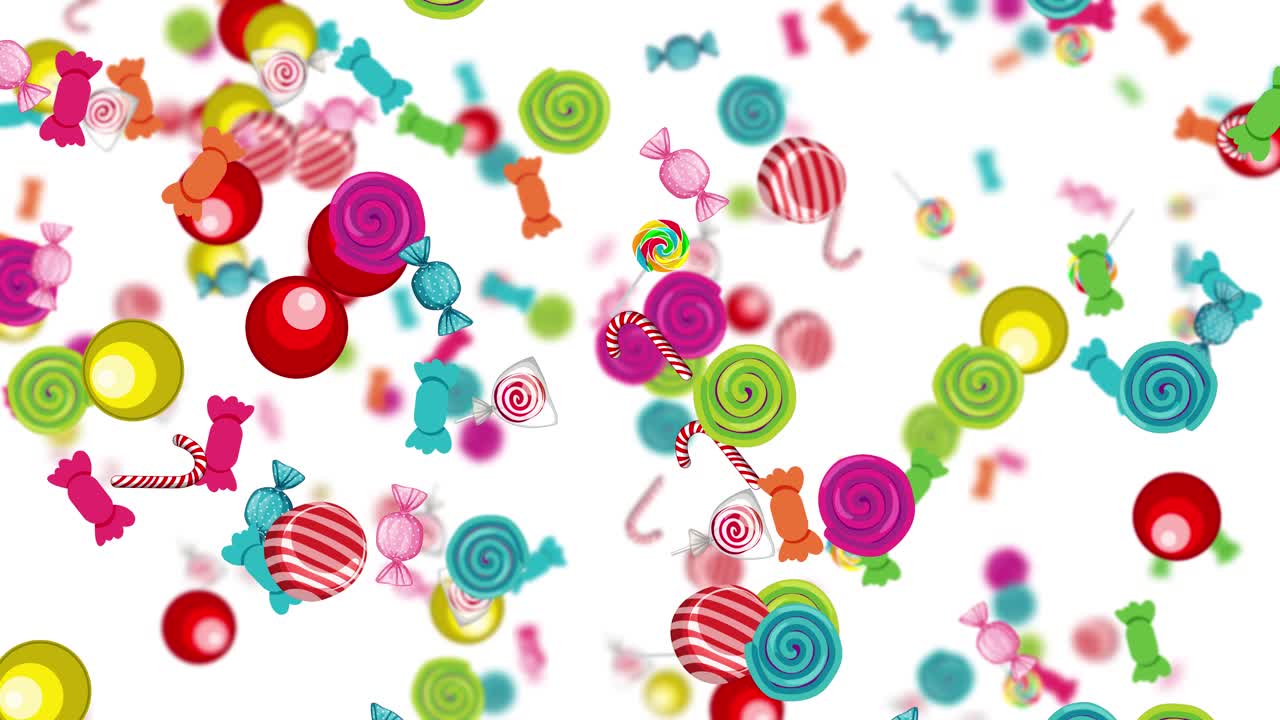 Vibrant candies falling against a white background