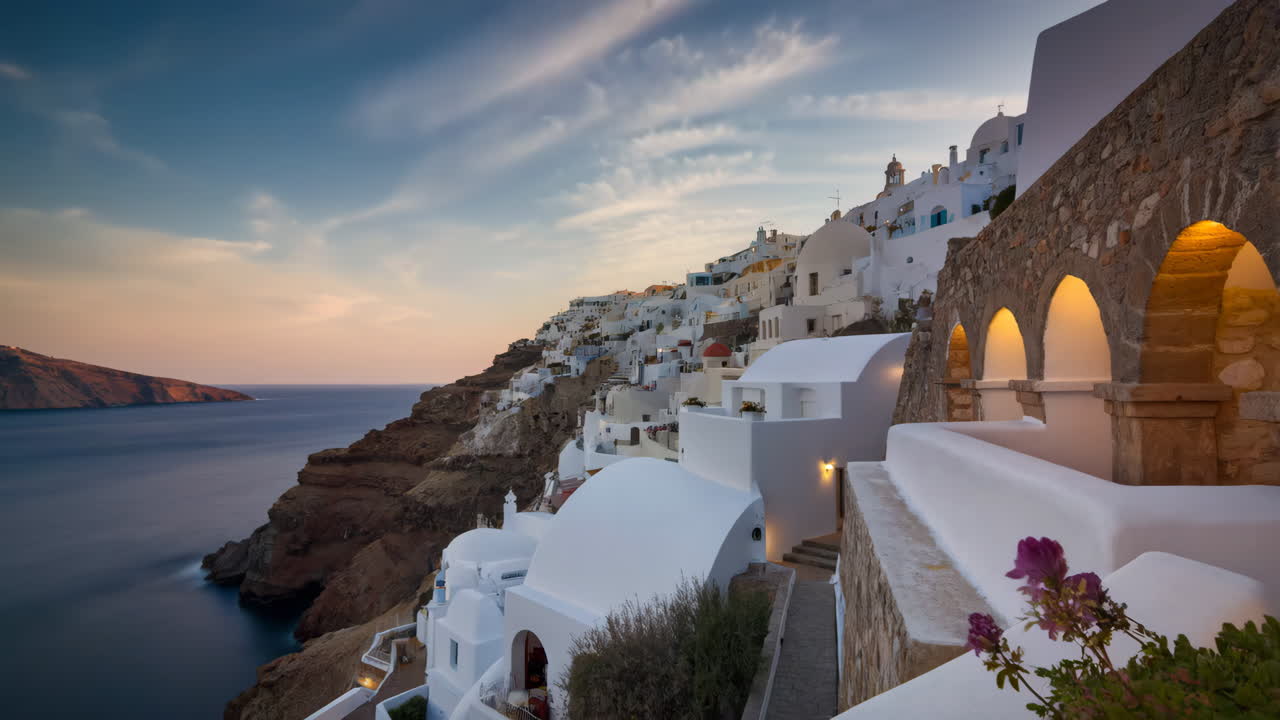 Beautiful Santorini village on a cliffside at sunset