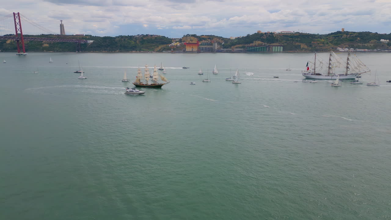 Panoramic view yachts floating at river in Lisboa. Drone scenic summer cityscape