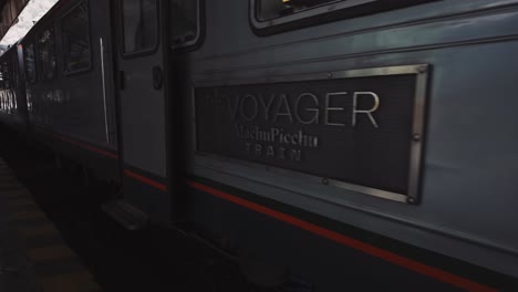 the machu picchu train awaits its scenic journey through the andes, cusco, peru - close up