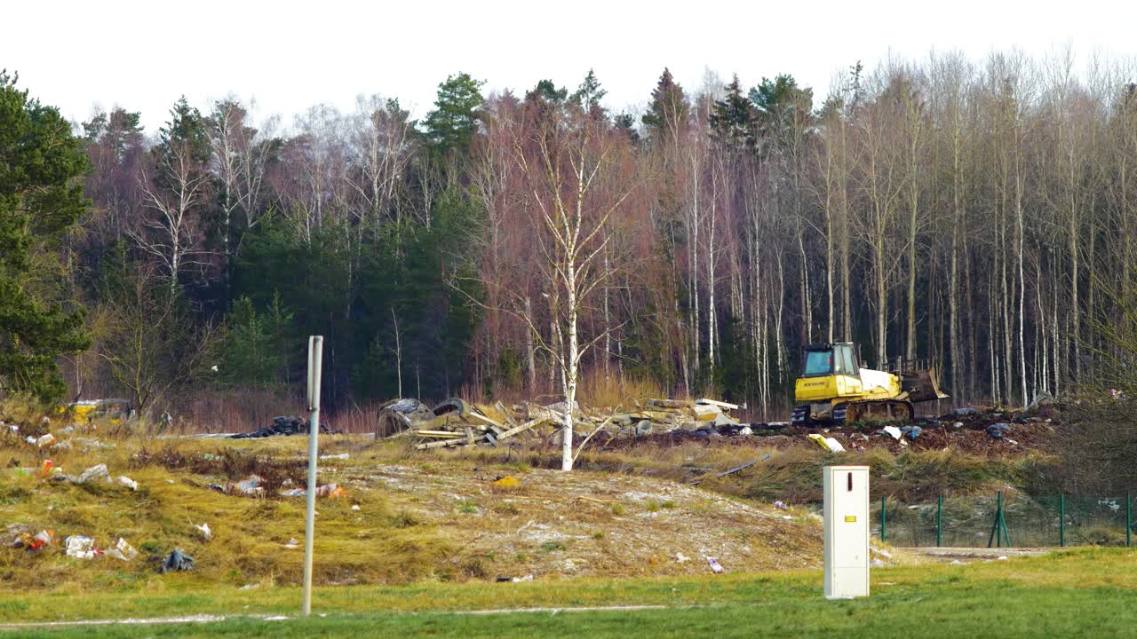 Stack of different types of large garbage dump, plastic bags, and landfill full of trash, environmental pollution, truck dump waste products polluting in a dump, distant wide shot
