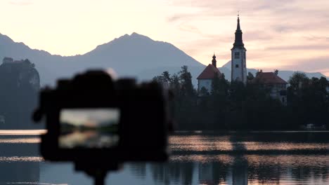 a beautiful reflection of lake bled at sunrise