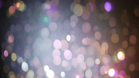 colorful bokeh lights moving over blurred background