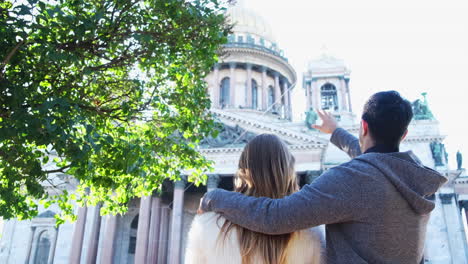 couple in front of a cathedral
