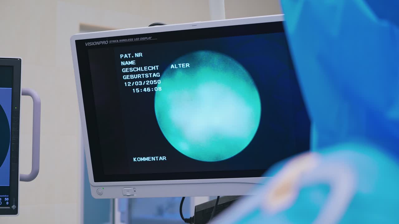 New technologies in clinic. Laparoscopic surgery on the screen of monitor in the operating room. Health care concept.