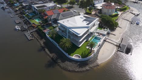 aerial view of luxury homes by the river