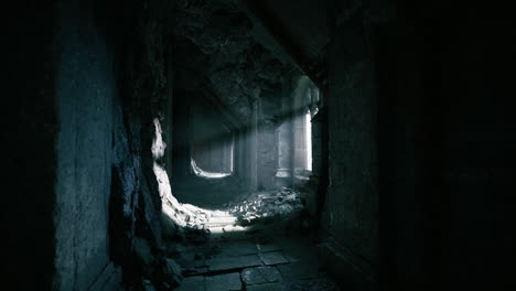 abandoned corridor with light streaming through broken windows