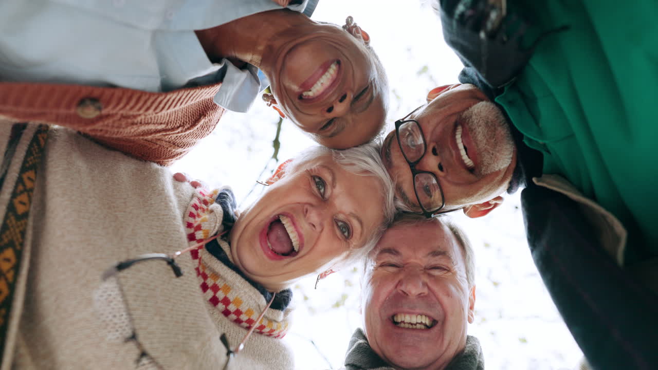 Senior people, circle and portrait below in a park