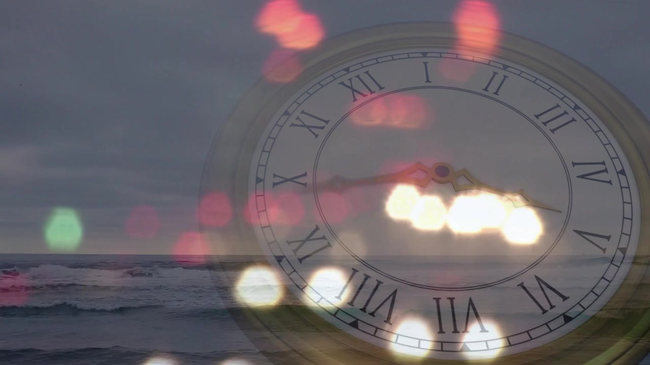 Double Exposure of Clock Face Over Ocean Waves at Sunset