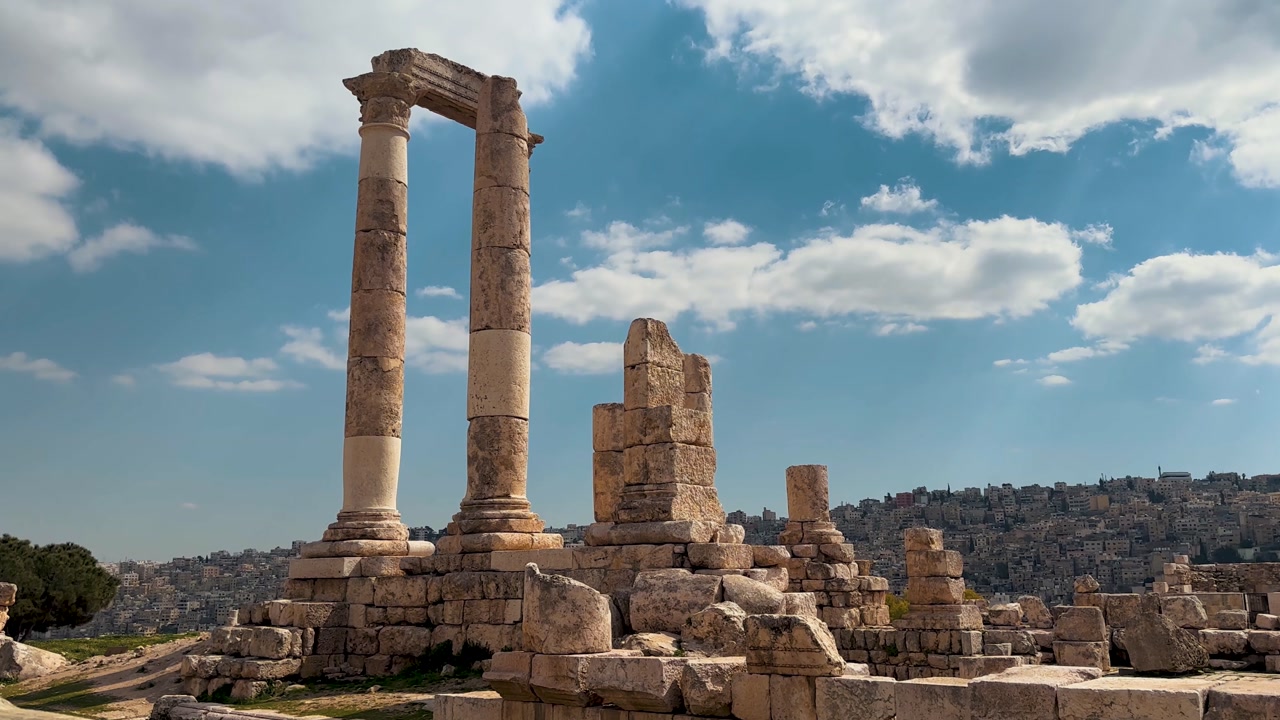 Tilting Up Shot Revealing Columns And Ruins Of The Temple Of Hercules At Amman Citadel In Jordan.