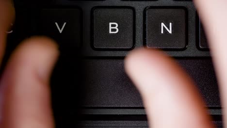 top view of hands typing space keyboard button