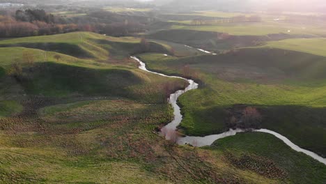 Aerial-Shot-Of-Majestic-Scenic-Landscape-With-River-At-Sunrise,-Travel-Destination-In-Sweden