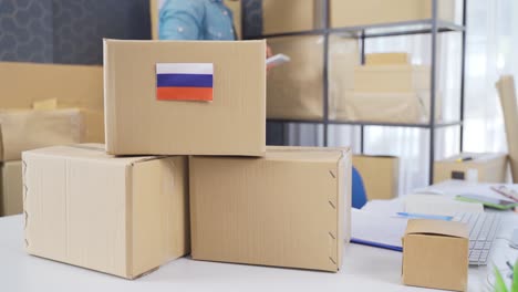 russia flag on logistic cargo package.