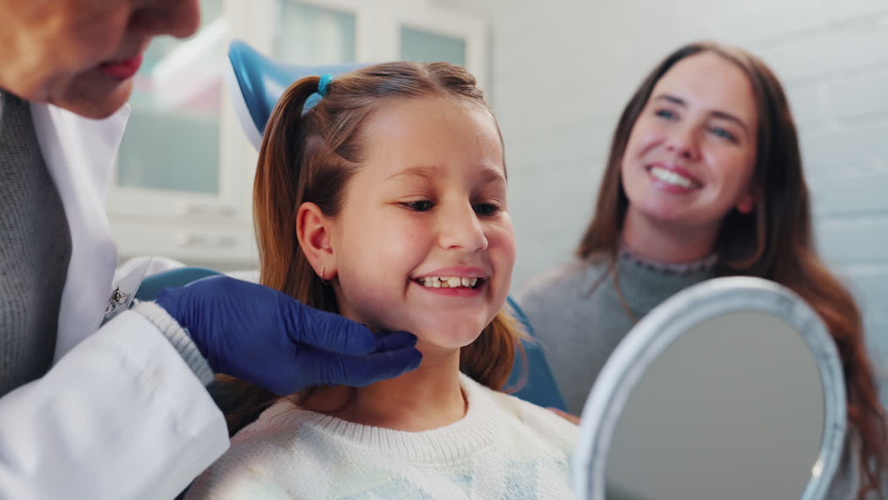 Child at the dentist with mother