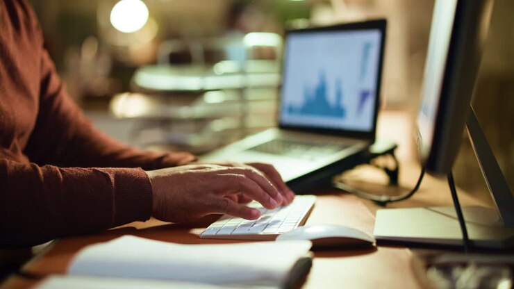 Working on a laptop at a desk