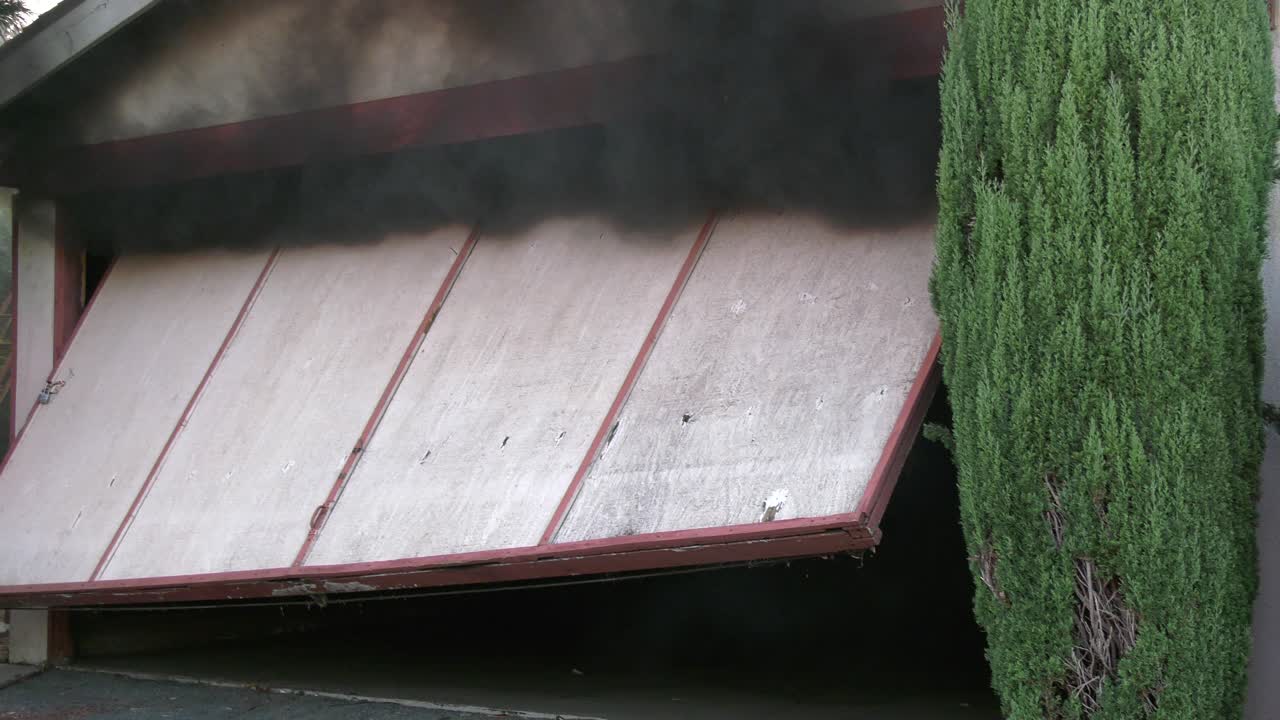 Firefighters battling a house fire