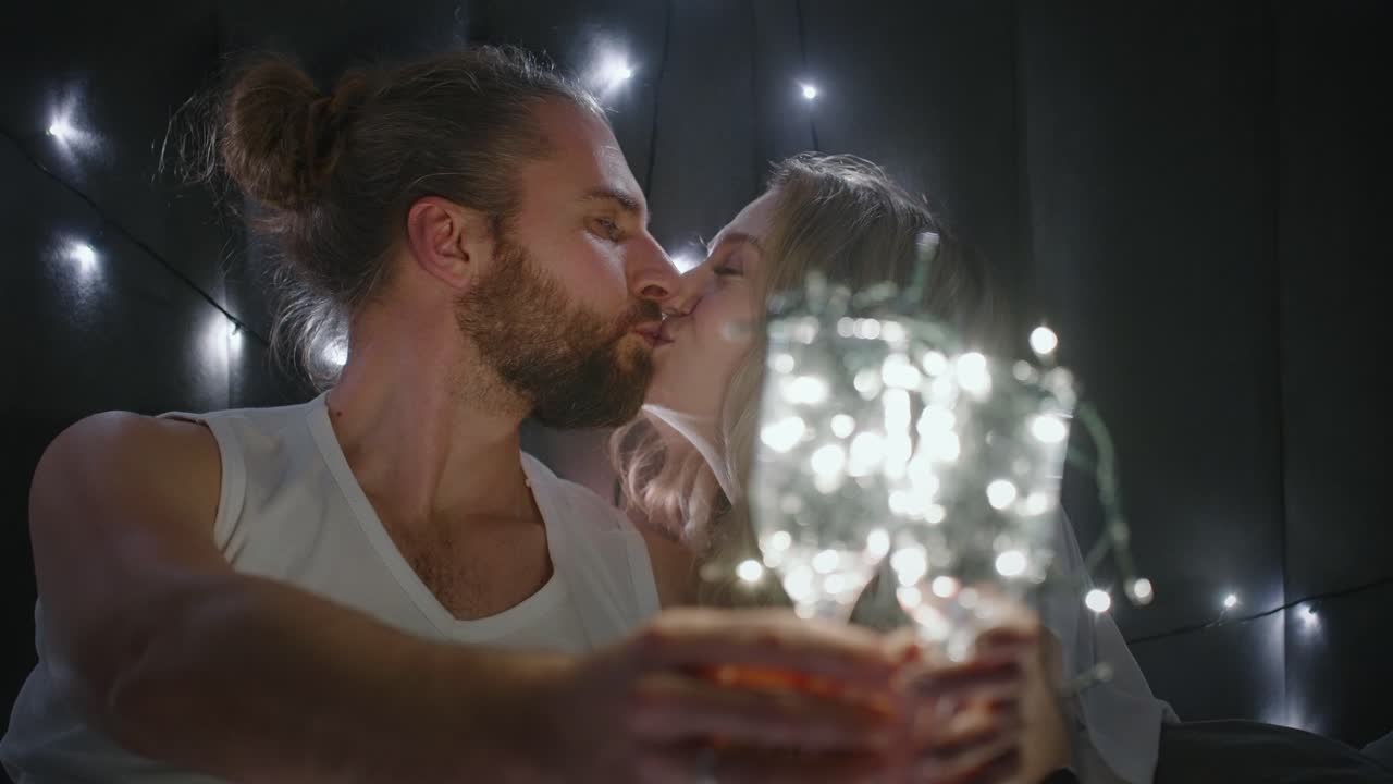 Couple Celebrating with Lights