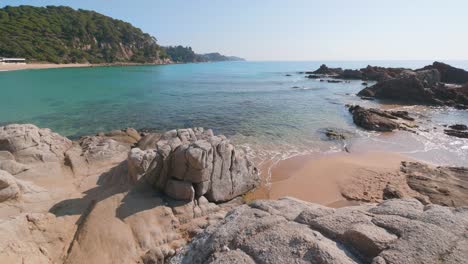 rocky shore beach landscape in lloret de mar, costa brava, spain