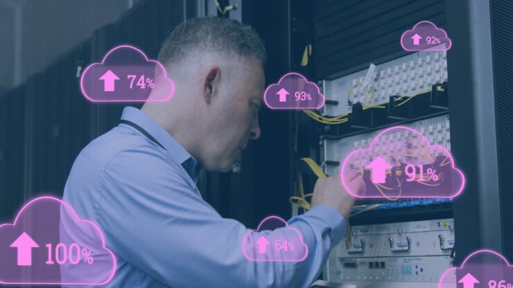 Animation of clouds with increasing numbers over caucasian man working in server room