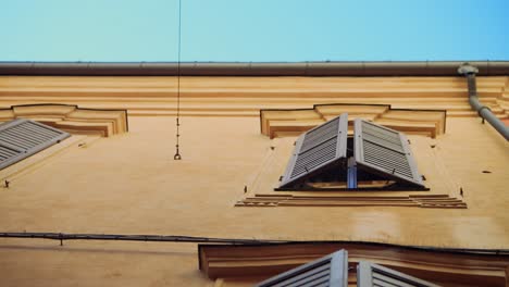 old building exterior with shutters
