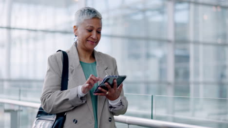 Phone,-walking-and-senior-business-woman-in-office