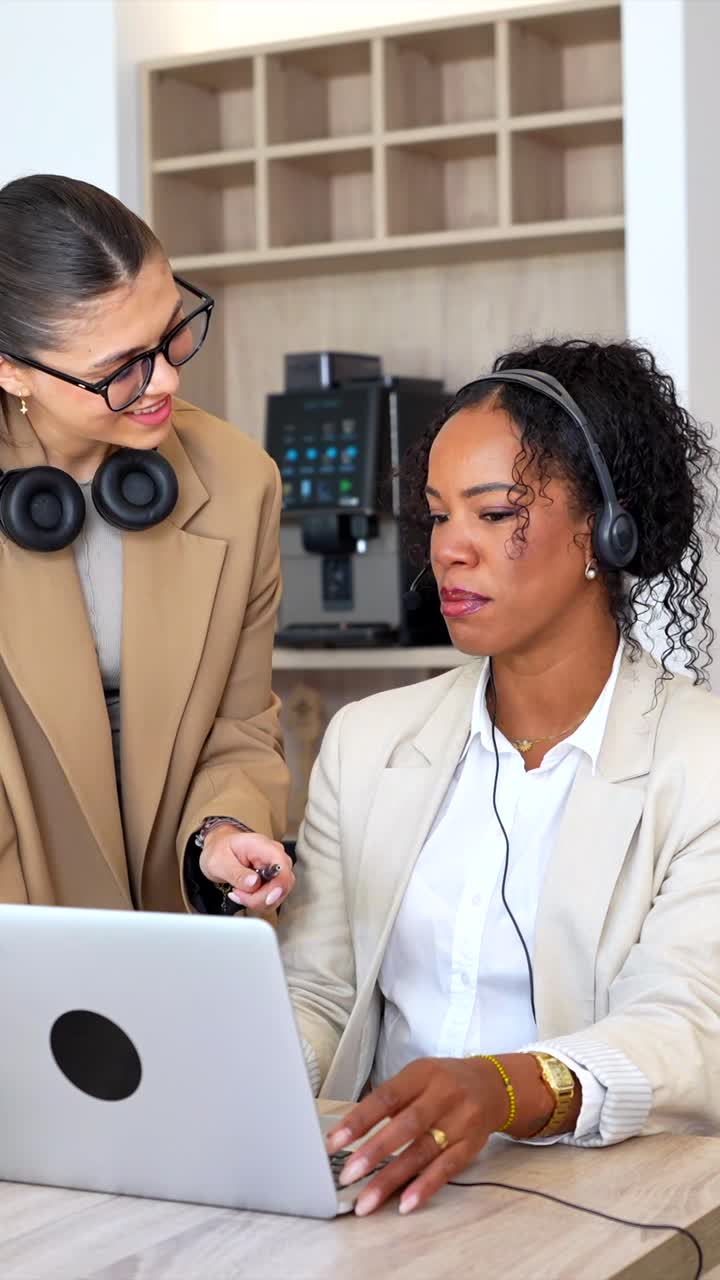 Two Businesswomen Collaborating at the Office