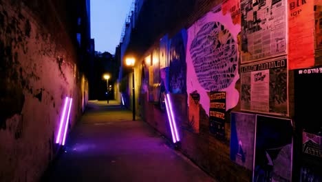 mysterious night alley with pink and purple neon lighting