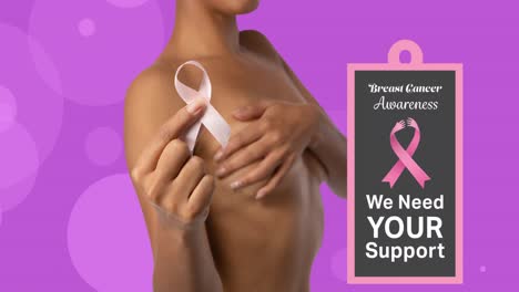 Animation-of-breast-cancer-awareness-text-mixed-race-woman-holding-pink-ribbon