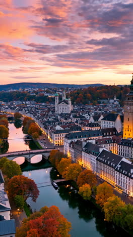 stunning autumn sunset over a european city and river