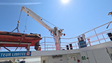 lifeboat being lowered from a ship