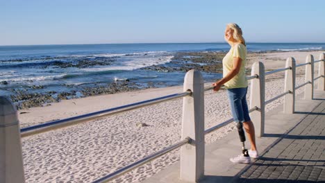 disabled woman standing in the beach 4k