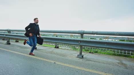 businessman running late on bridge