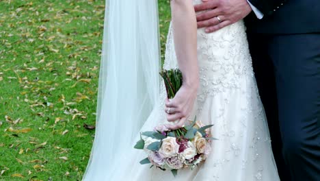 shot-of-bride---groom-with-wedding-flower