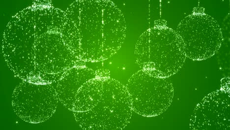 christmas balls on green background.